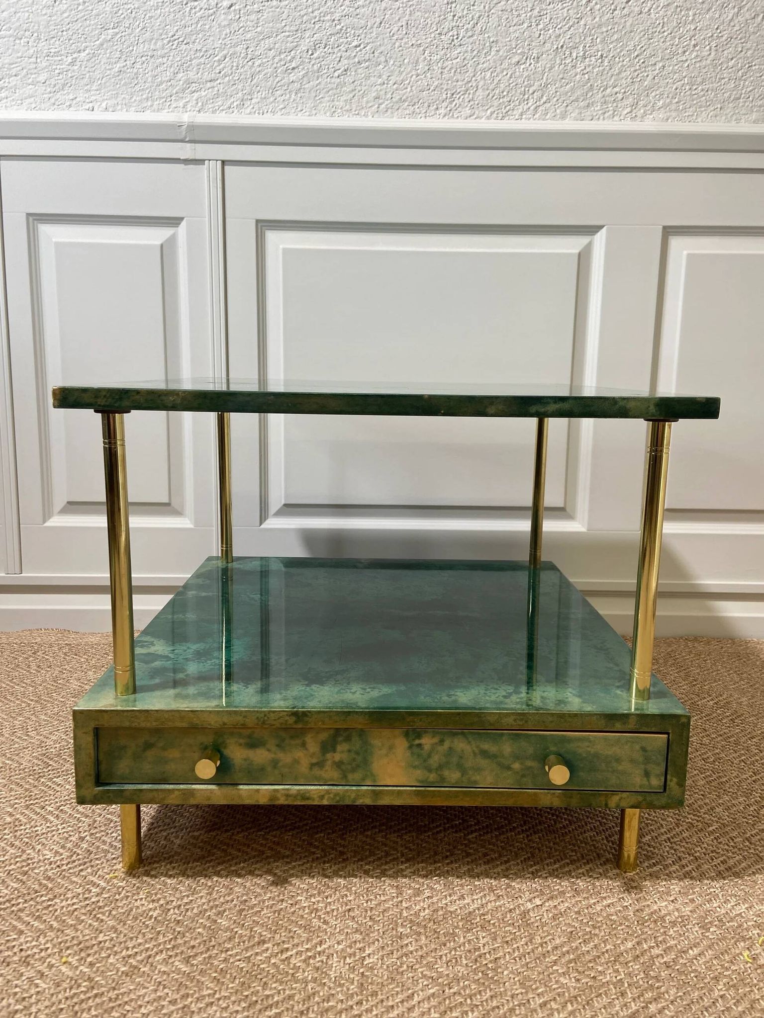 Aldo Tura side table in aqua green with brass legs and lower drawer.