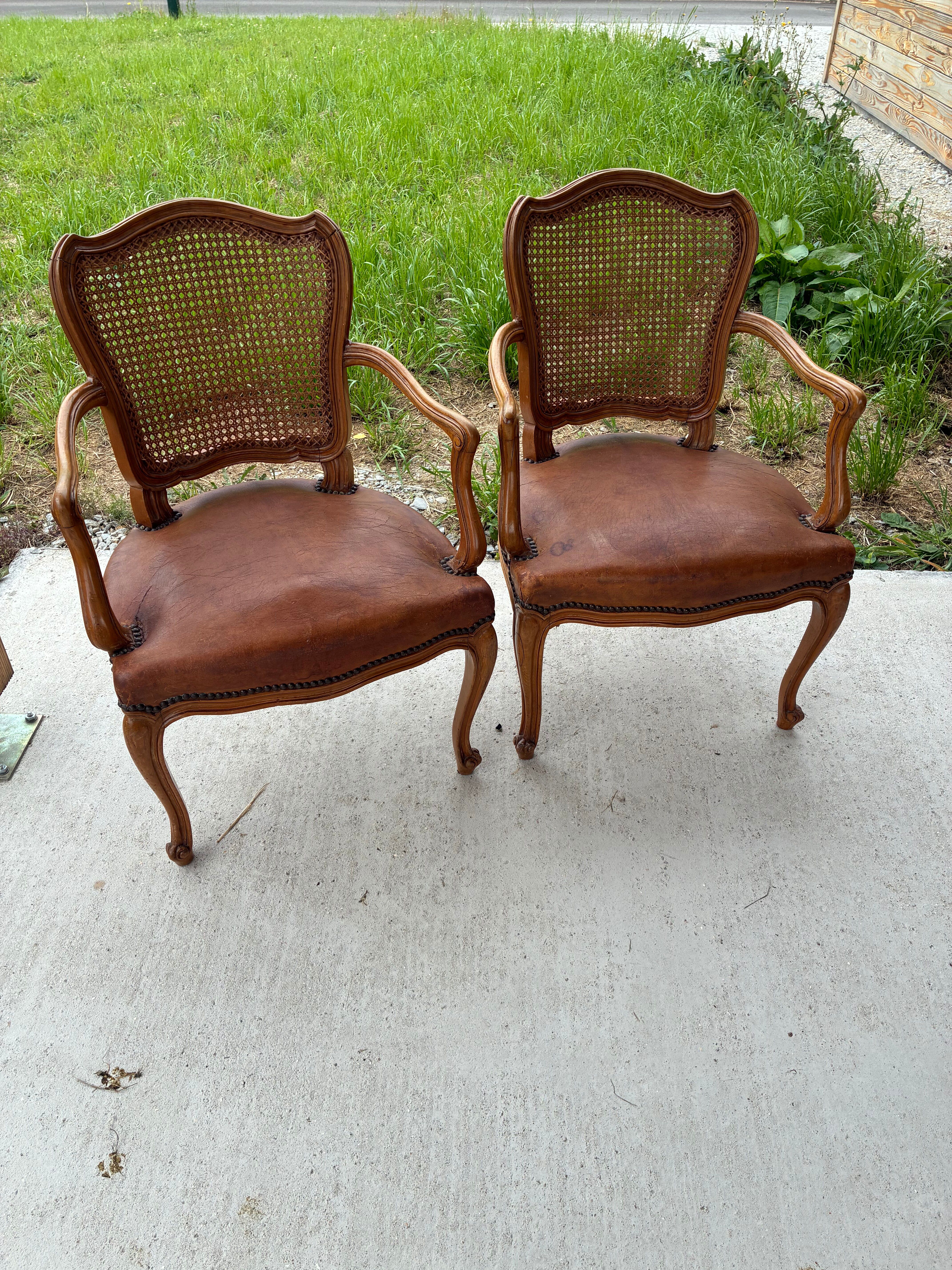 Cane and leather armchair in Louis XV style