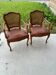 Cane and leather armchair in Louis XV style