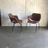 Set of 2 mid-century brown faux leather armchairs with black metal legs, 1960s.