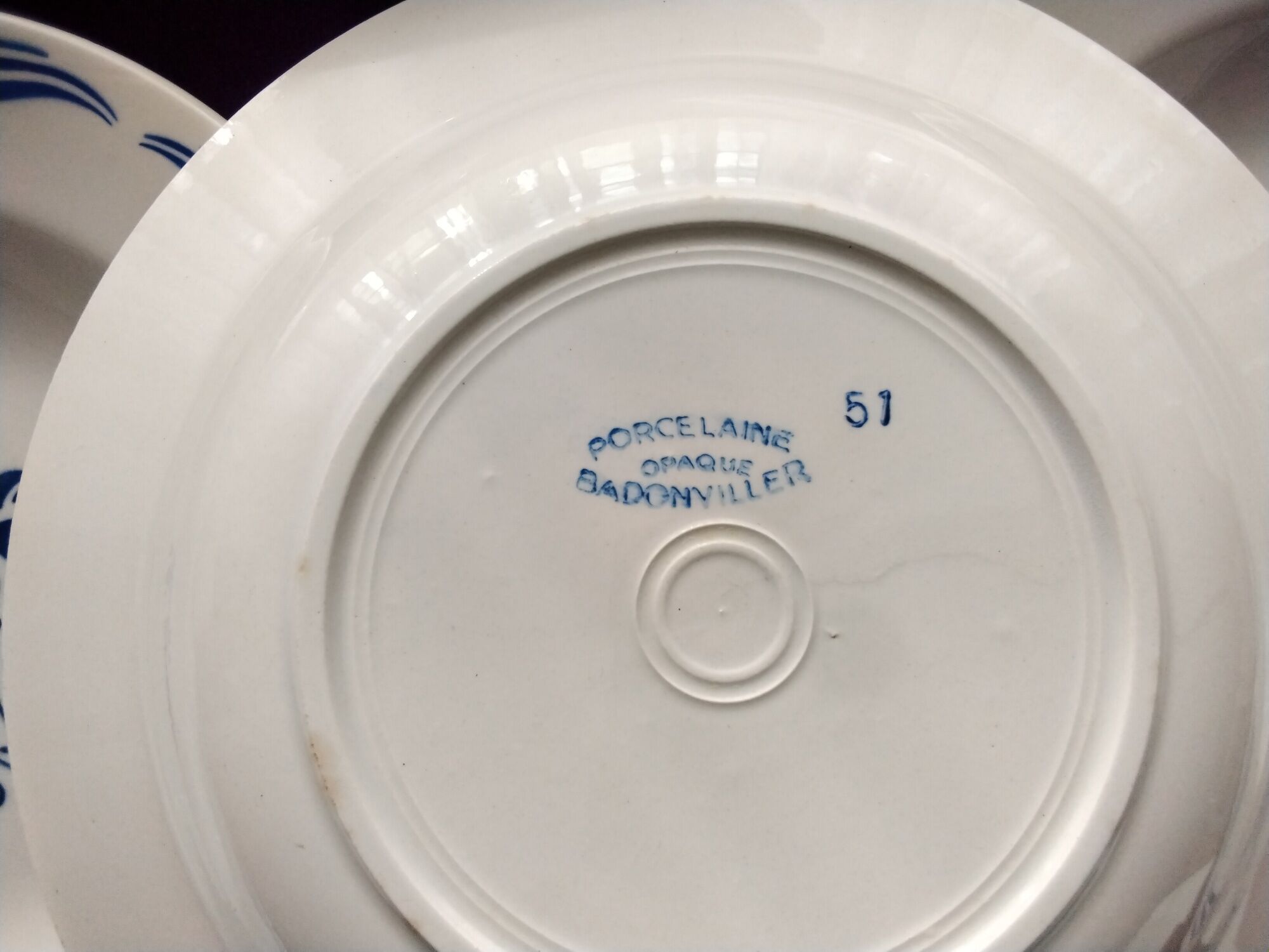 Set of 6 mismatched hollow plates in opaque porcelain from Badonviller