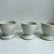 Trio of white shells bordered gold 50s