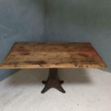 Old table on cast iron machine leg