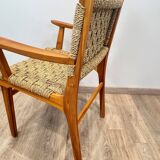 Pair of woven teak armchairs