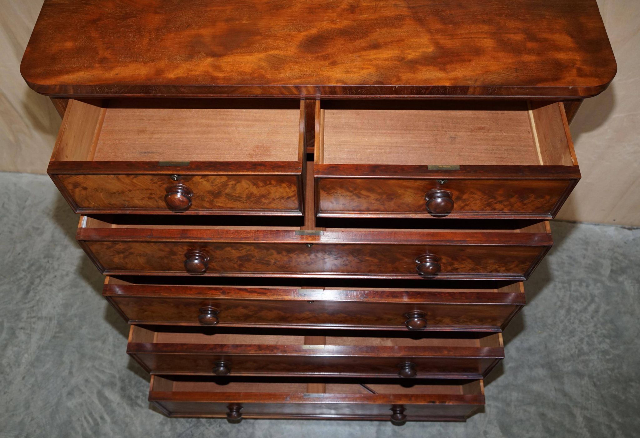 Victorian commode in flame wood with four drawers