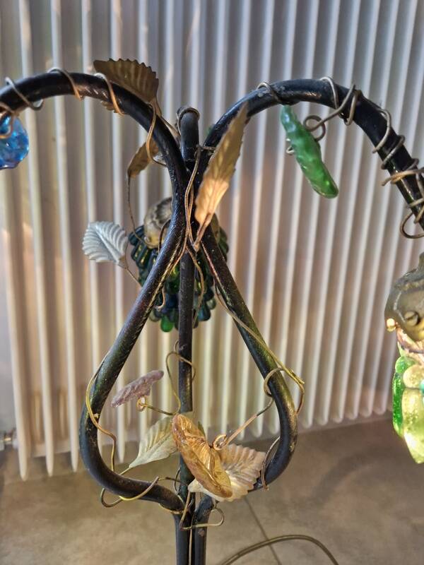 Bronze table lamp and Murano glass grape clusters.