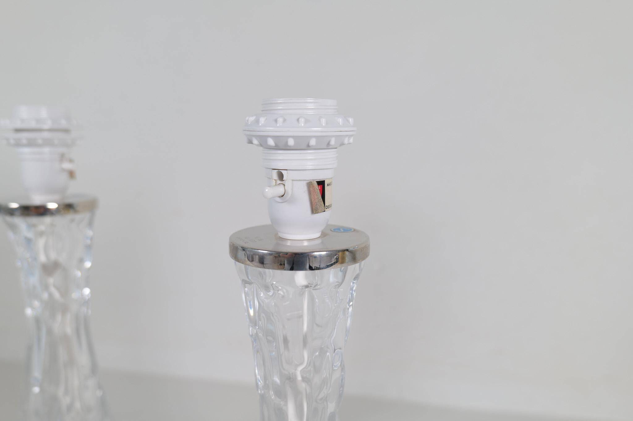 Mid-century modern crystal table lamps by Orrefors, designed by Carl Fagerlund, Sweden, 1970s.