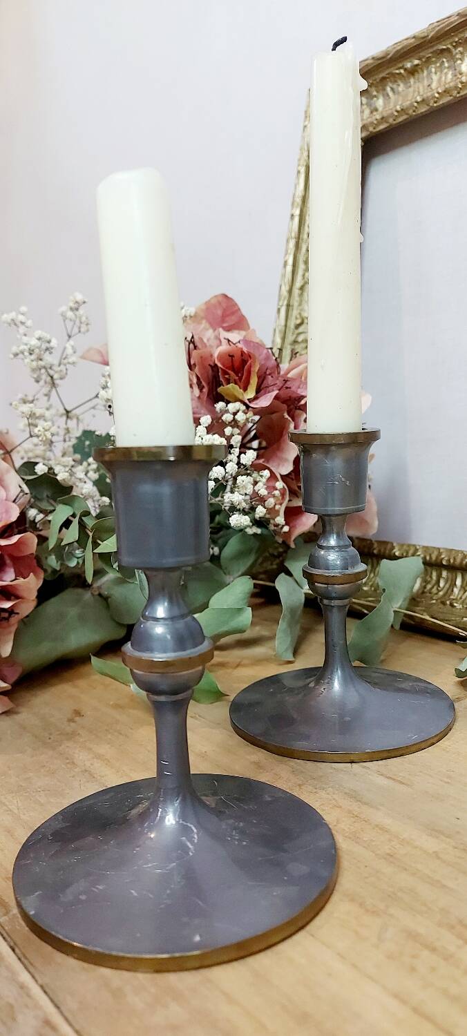 Pair of pewter candle holders