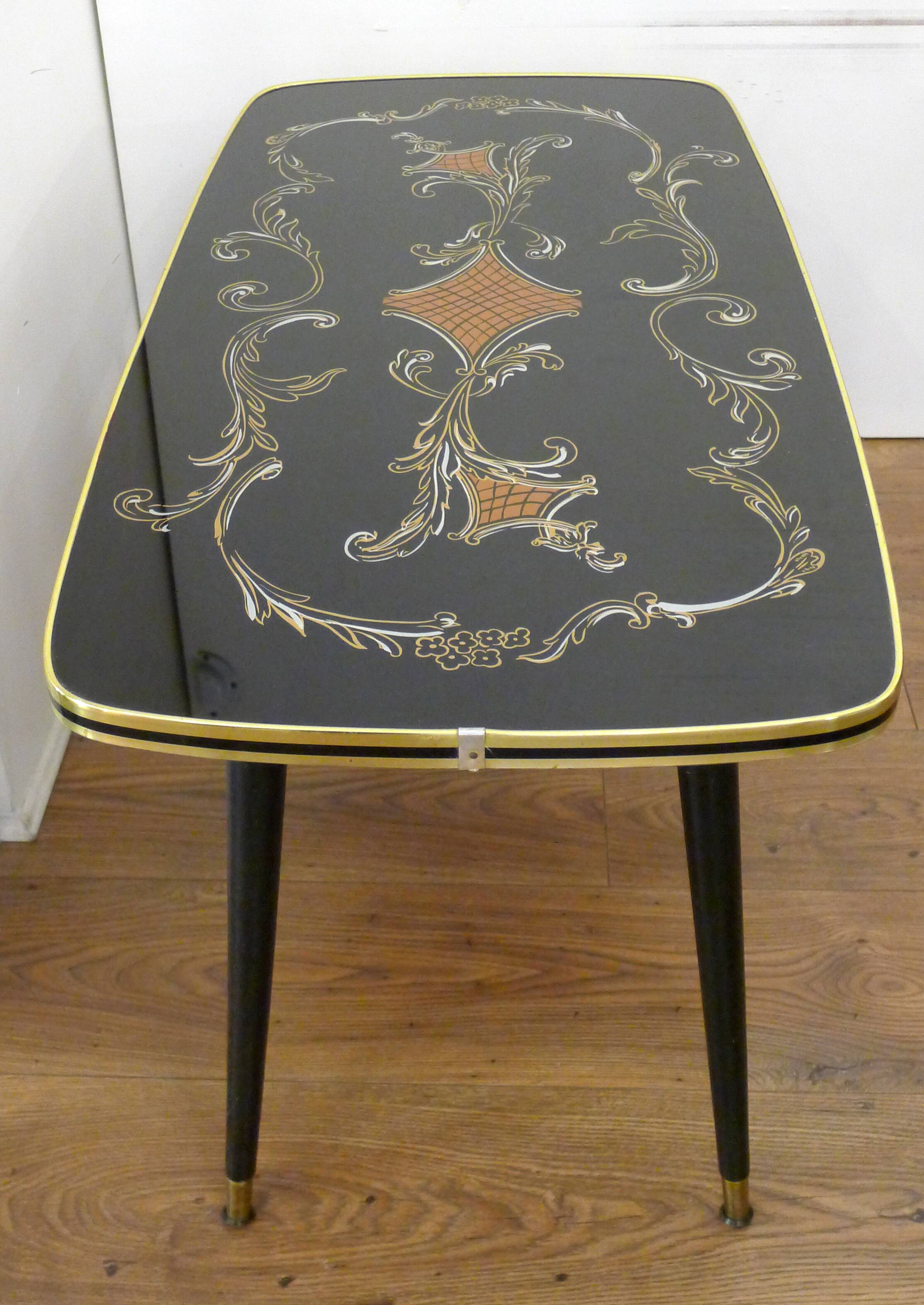 Large coffee table 1960s Rococo style with tapered legs.