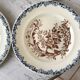 Set of 4 flat plates in Terre de Fer, Rocaille model, 19th century