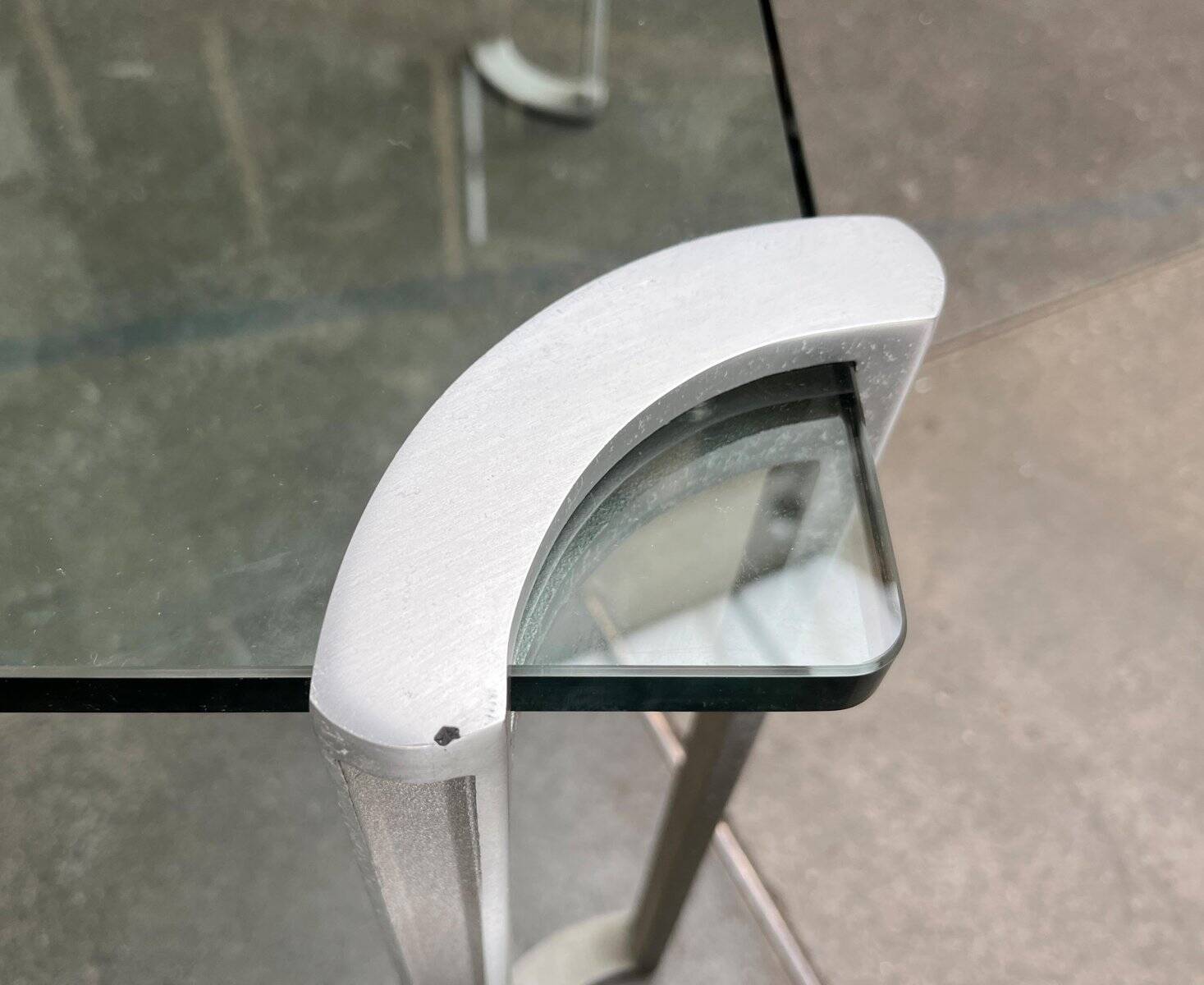 Vintage Space Age coffee table in glass and aluminium attributed to Peter Ghyczy, 1970s.