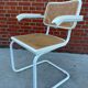 Cesca Chair model with armrest in white