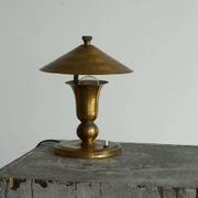 Art Deco table lamp in patinated brass from the 1940s.