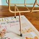 Golden metal magazine holder