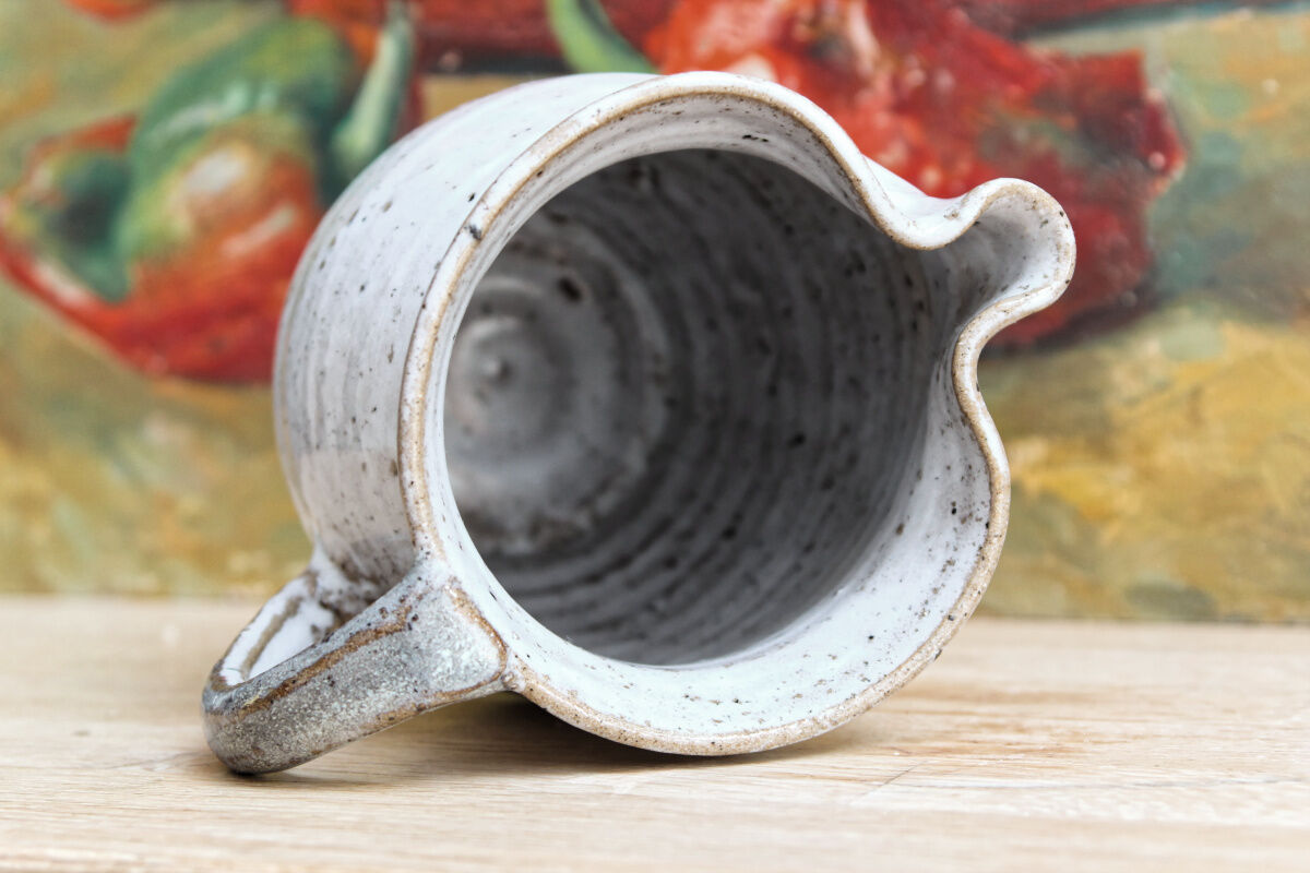 Pair of glazed terracotta pitchers