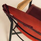 Maërl armchair, Galathée model, red leather, solid wood armrests of your choice