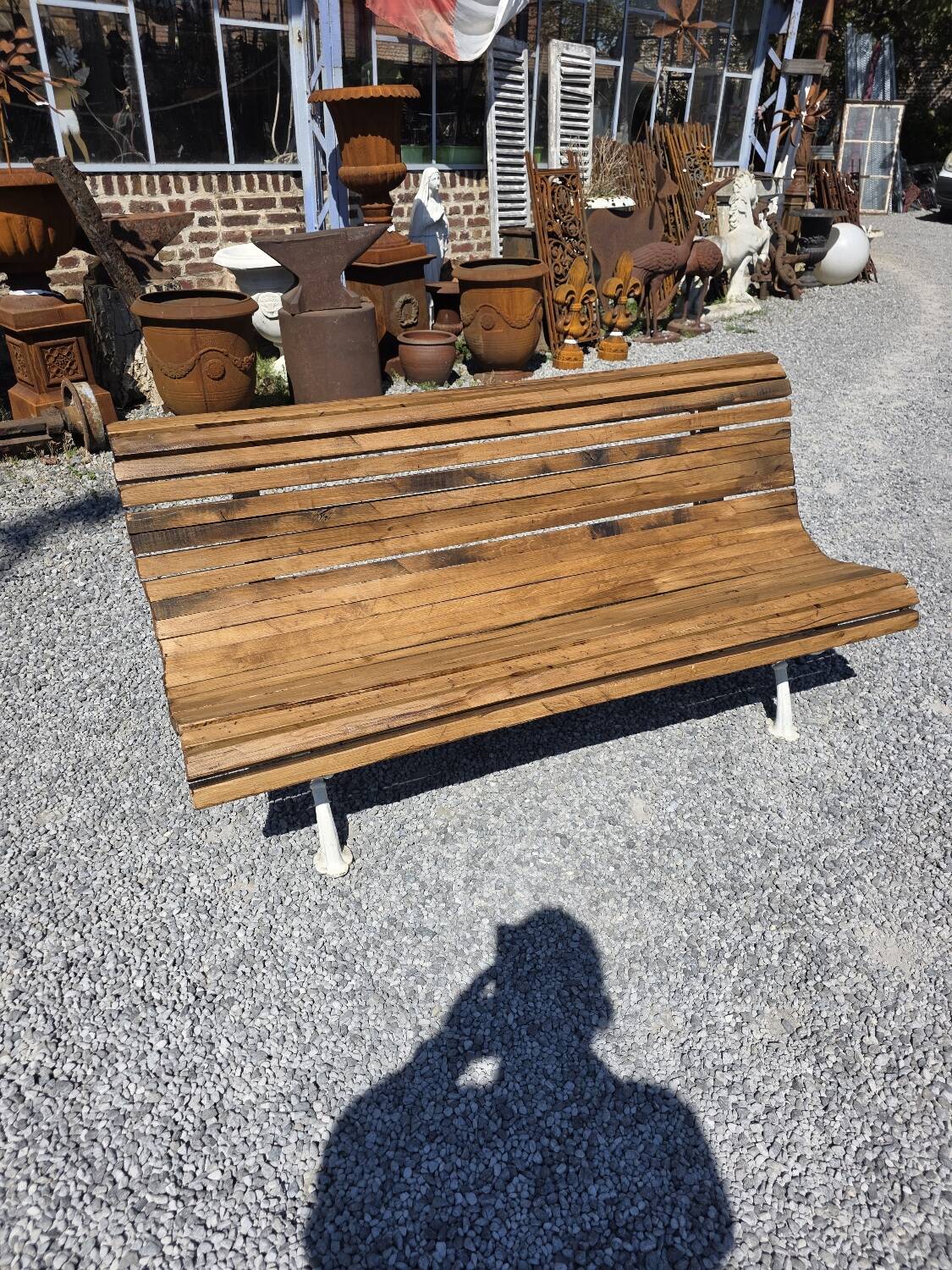 Antique garden bench made of cast iron and oak slats