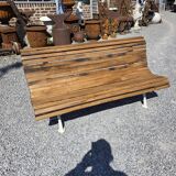 Antique garden bench made of cast iron and oak slats