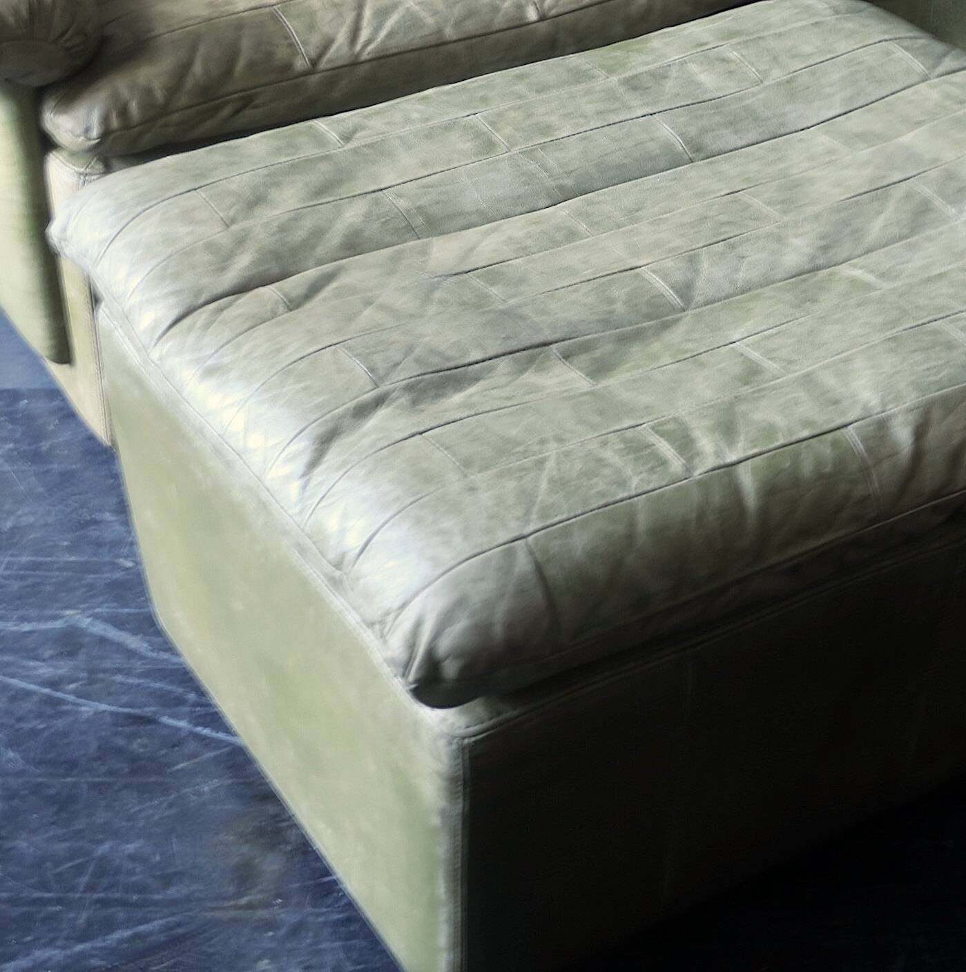 Patchwork leather olive green lounge chair and ottoman by Laauser, 1970s