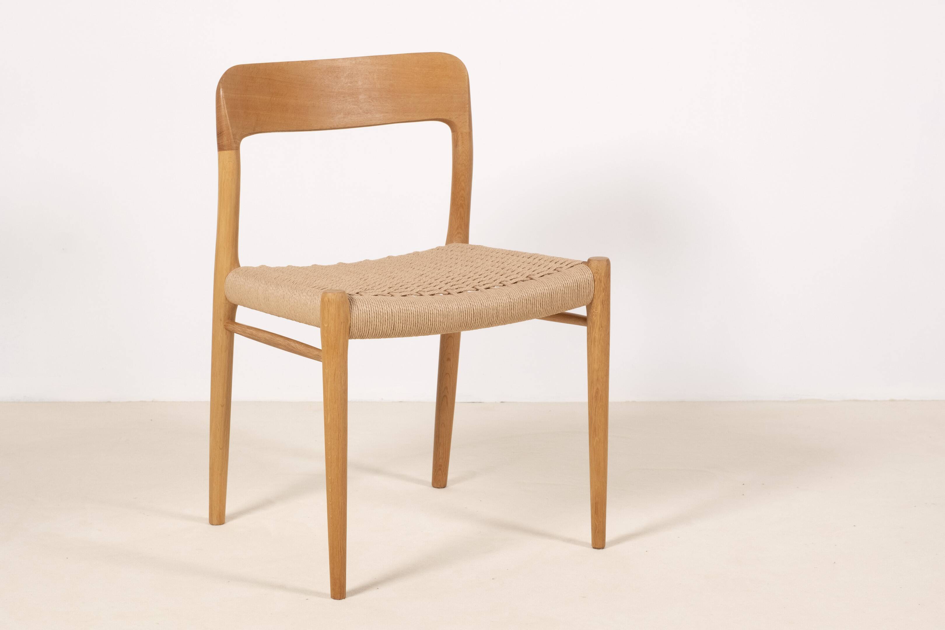 8x Niels O. Møller Model 75 in Oak, 1960s Denmark