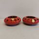 Pair of candle holders from the 1960s-1970s, crafted in red ceramic