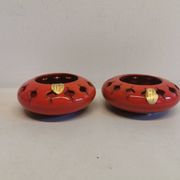 Pair of candle holders from the 1960s-1970s, crafted in red ceramic