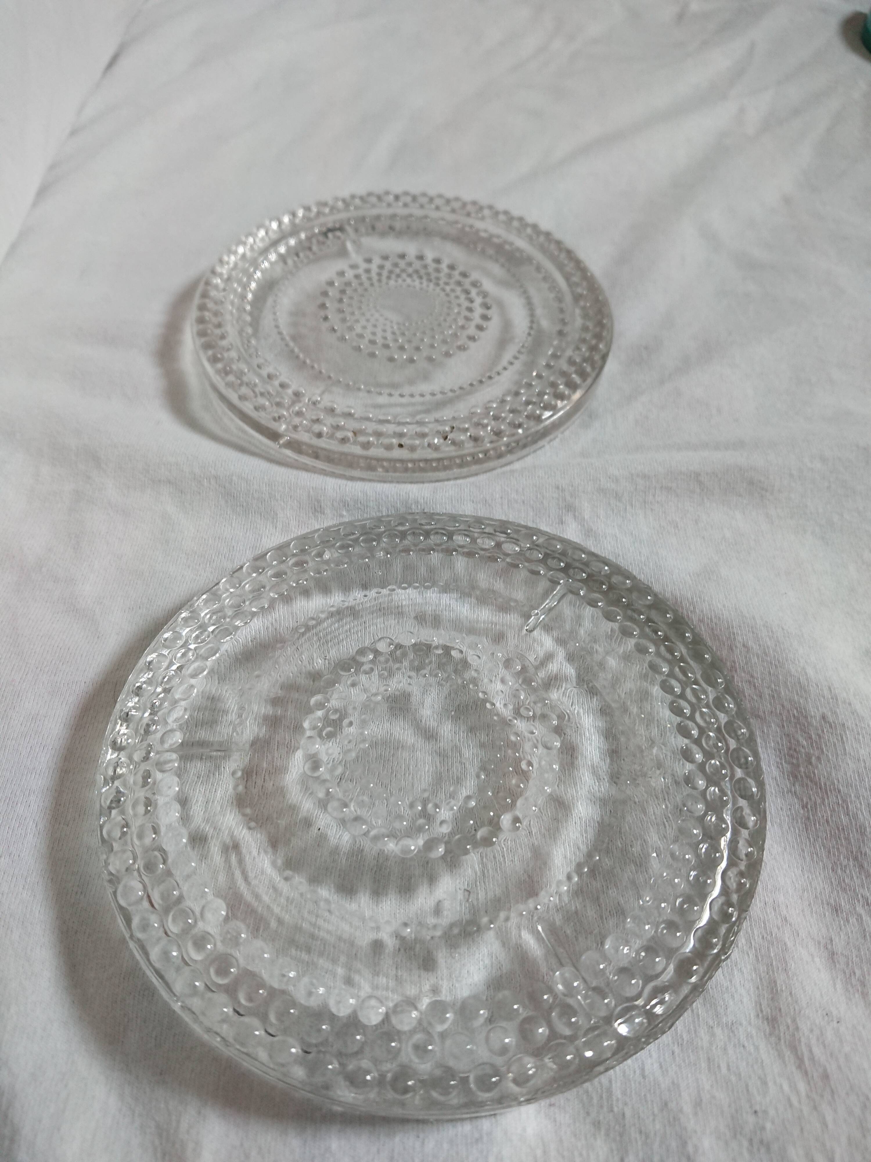 2 beaded glass bottle bottoms