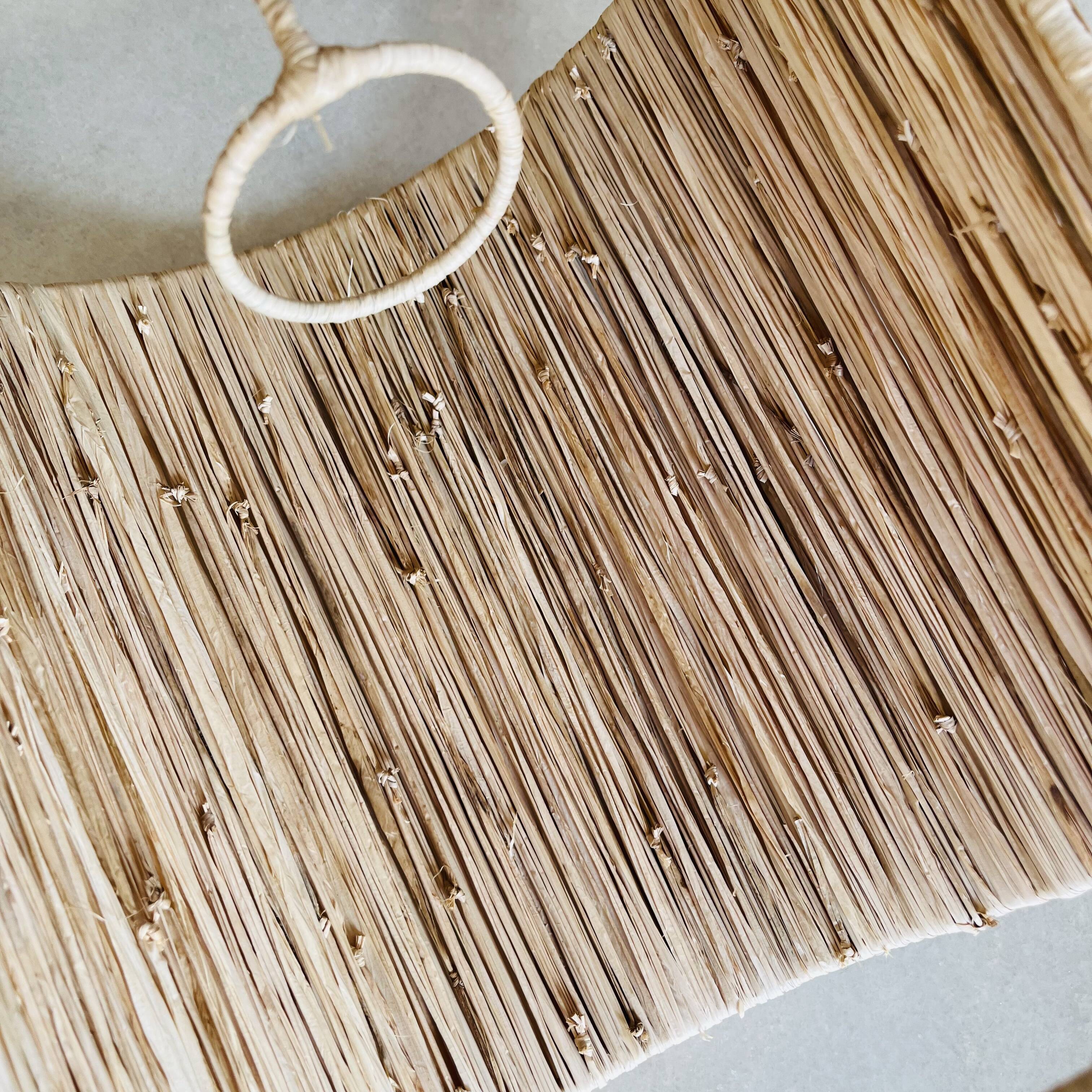 Raffia wall lamp