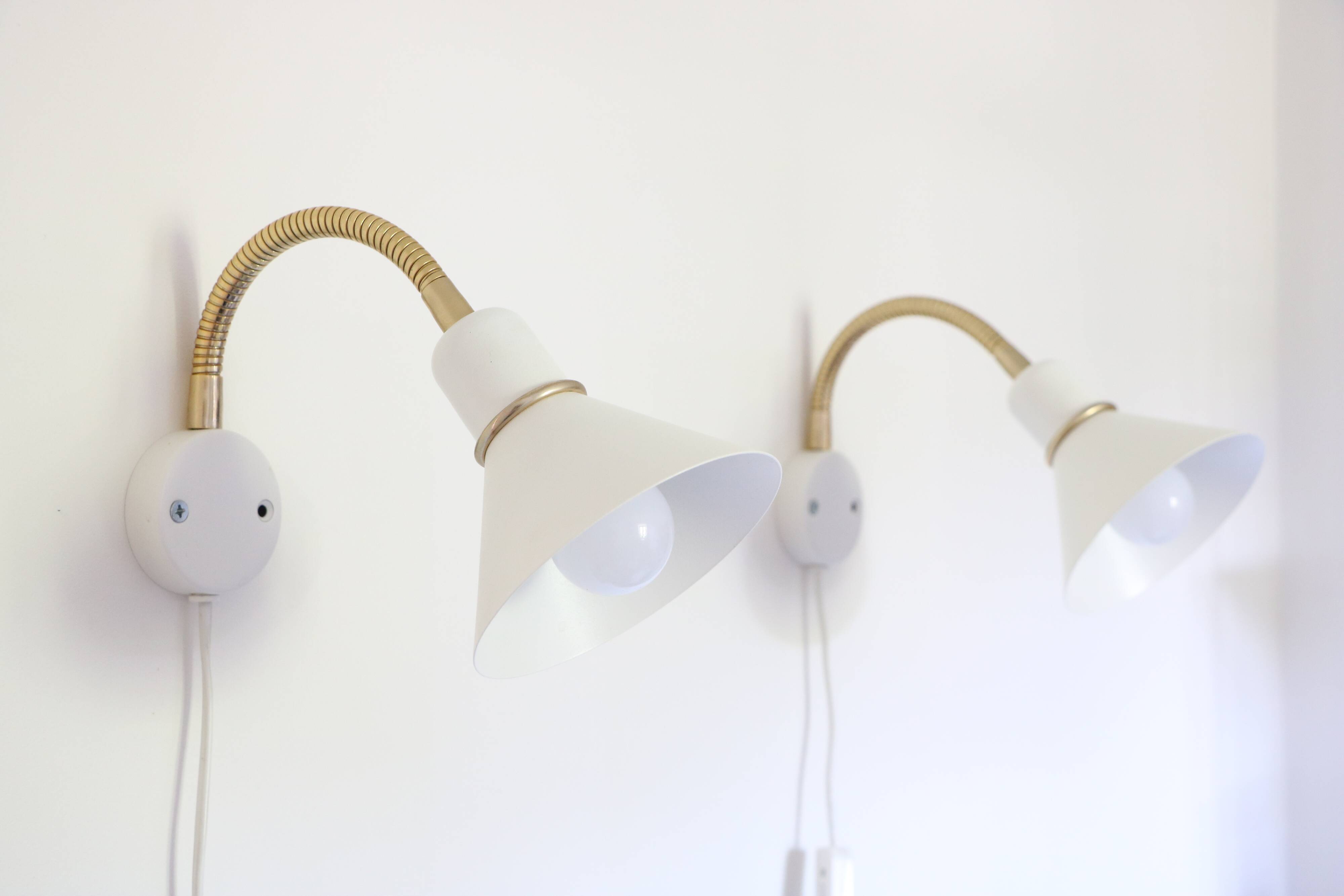 Pair of Scandinavian wall lights, white and gold metal
