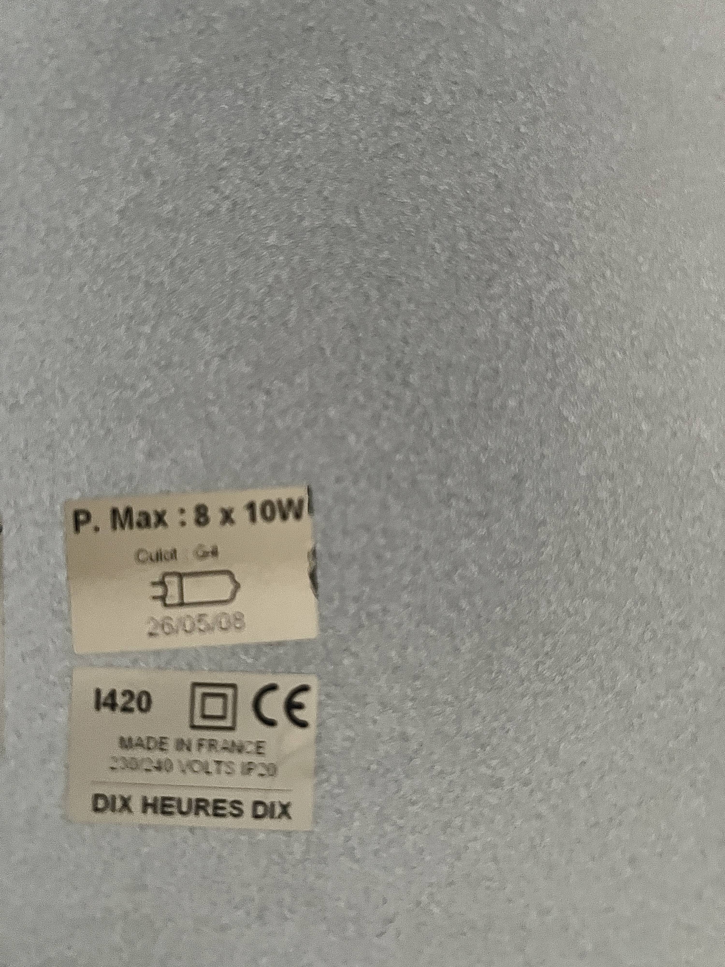 Modernist wall lamp with white metal shade, design by C. Grandidier.