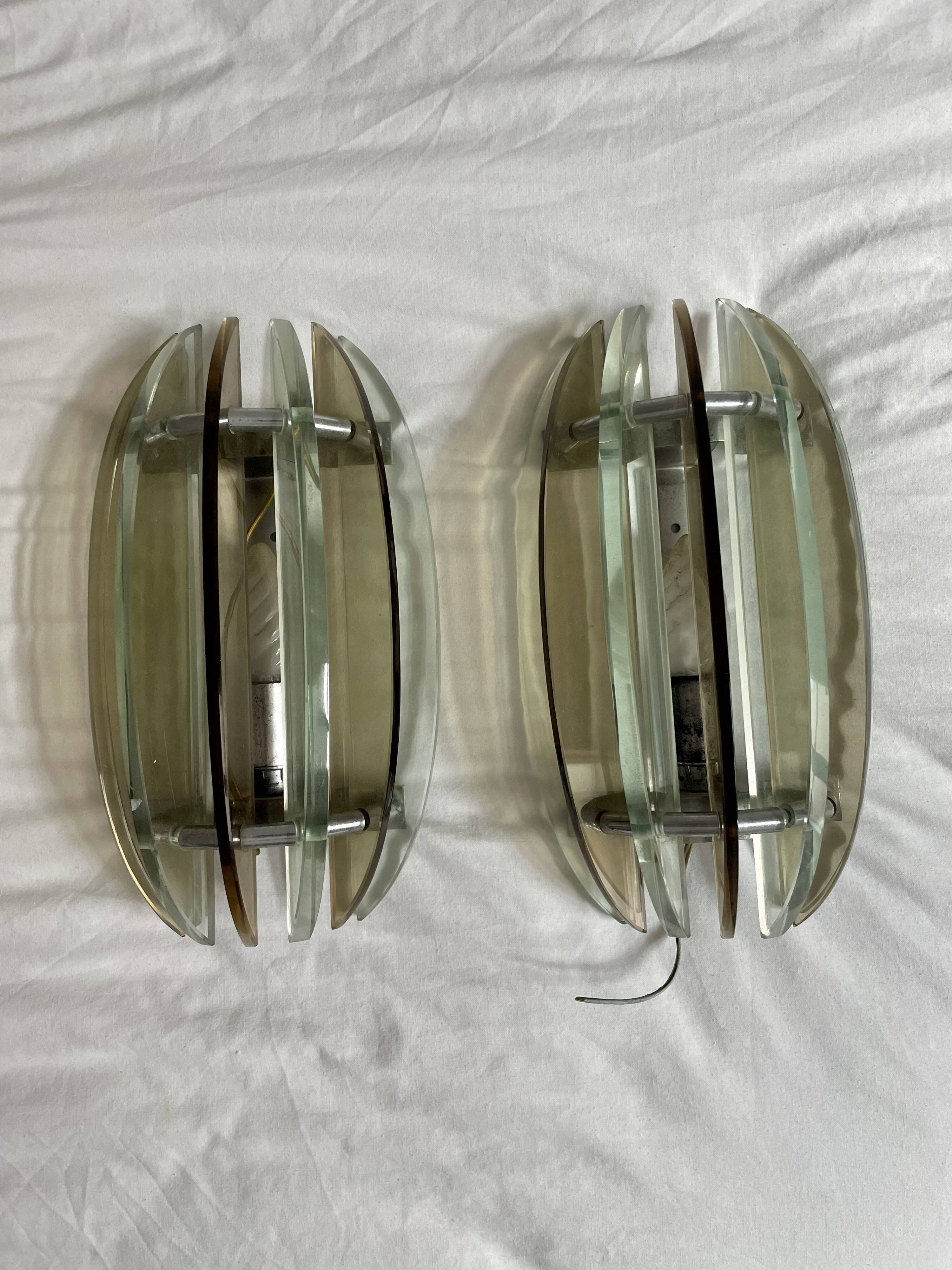 Pairs of VECA wall lights