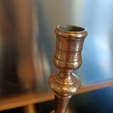 Chiseled candlestick in gilded bronze