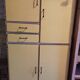 Yellow formica kitchen cabinet