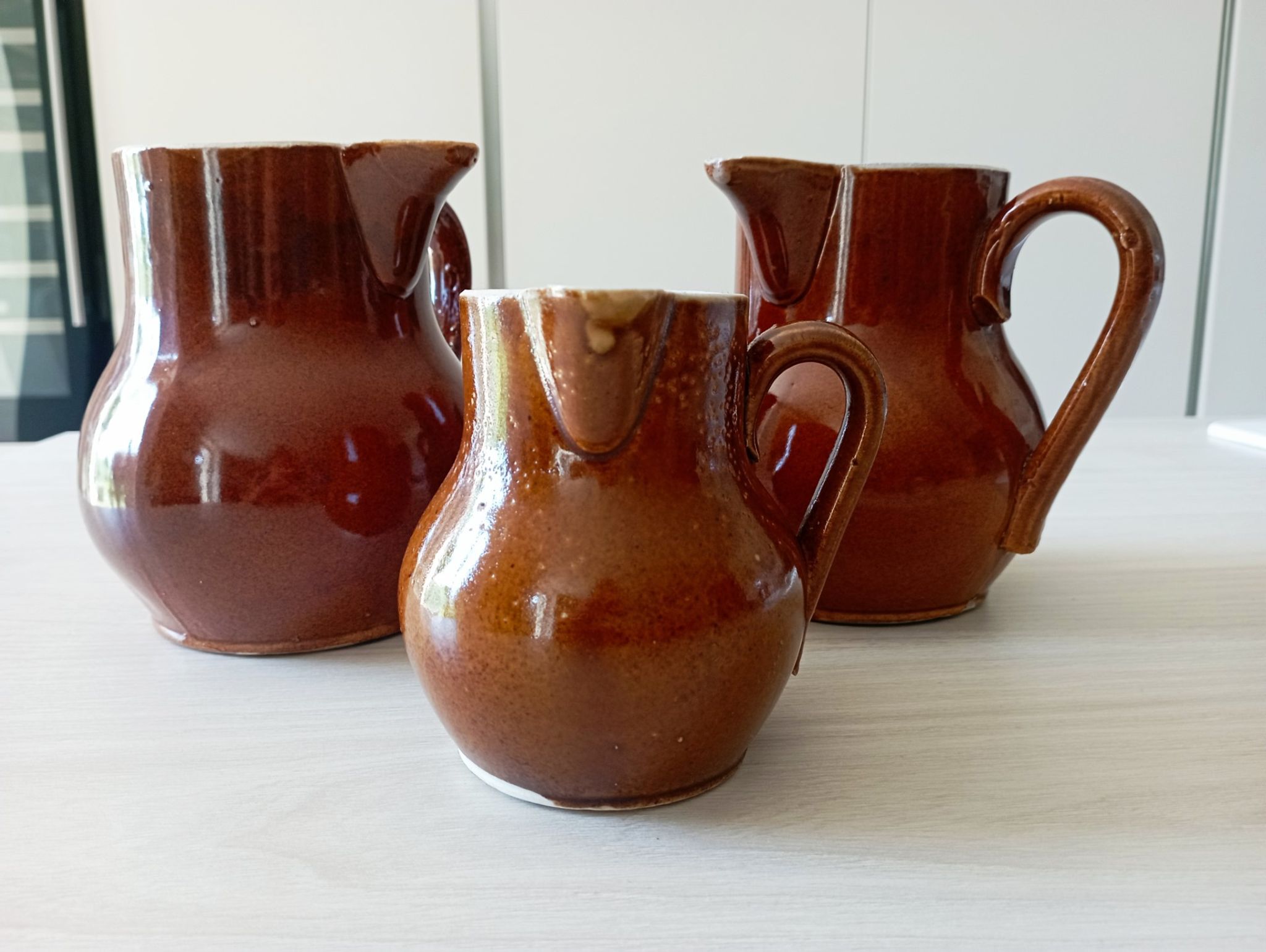 Set of 3 antique pitchers