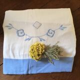 Embroidered cotton linen sheet with blue border