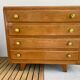 Oak art deco chest of drawers, compass legs