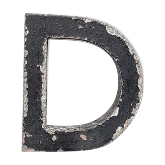 Store sign letter D in zinc