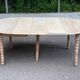 Renovated Louis Philippe round extendable dining table with flaps and 3 extensions.