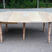 Renovated Louis Philippe round extendable dining table with flaps and 3 extensions.