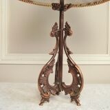 Rock-style table lamp with its vintage bird pattern shade