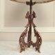 Rock-style table lamp with its vintage bird pattern shade