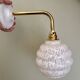 Vintage globe wall light in white Clichy glass