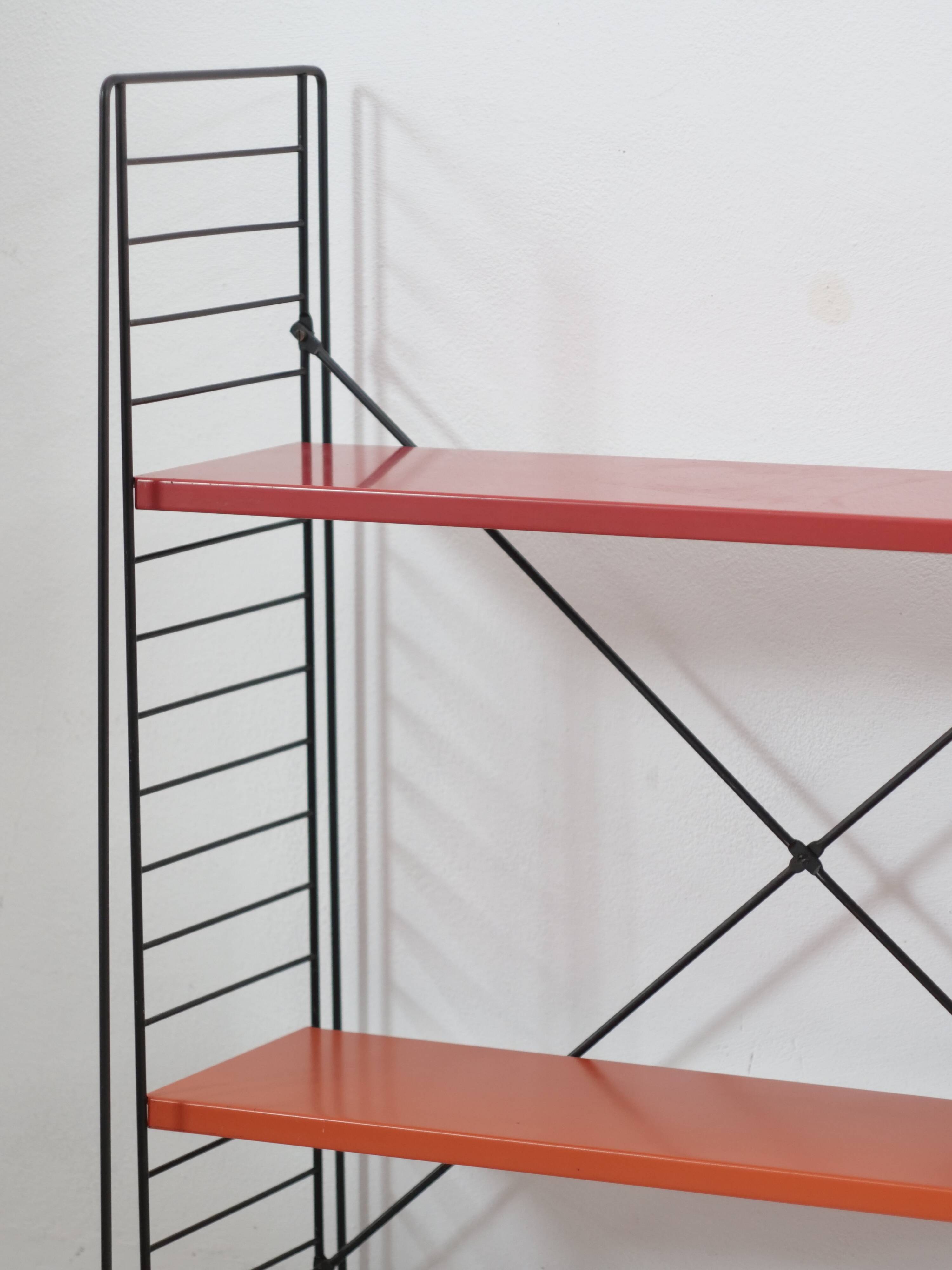 Tomado shelf in coloured metal floor shelves from 1958.
