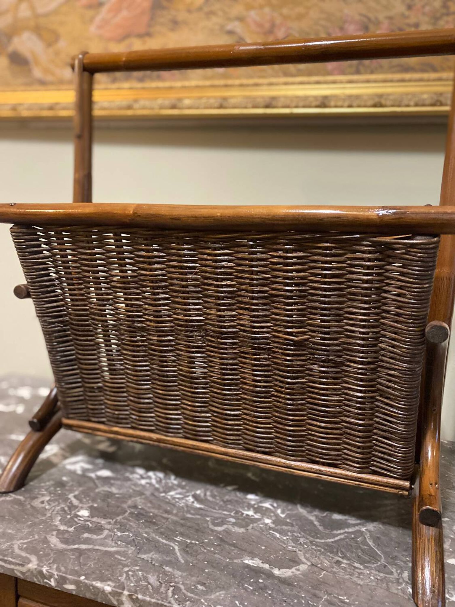 Wicker and brown wood magazine rack
