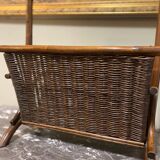 Wicker and brown wood magazine rack