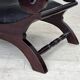 1970s, vintage armchair with footstool, black furniture leather.