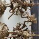 Paire de chandeliers antiques à 3 feux de lumières puttis/angelots bronze