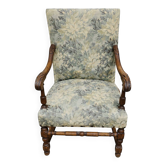 Empire armchair in carved wood and floral fabric