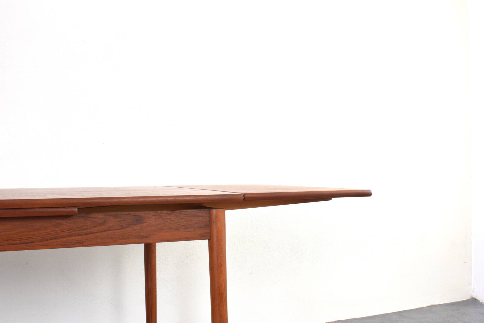 Mid-century Danish teak extendable dining table, 1960s.