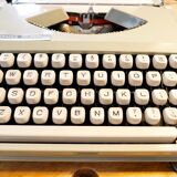 Blue green baby hermes typewriter